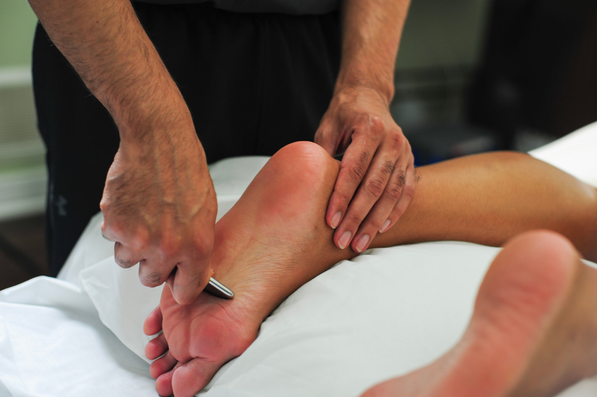 IASTM treatment on the foot and plantar fascia